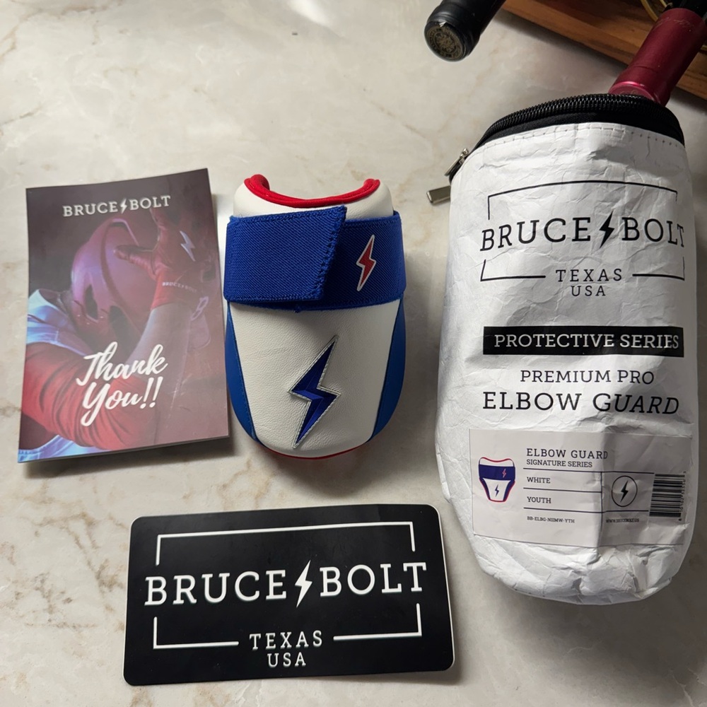 Bruce Bolt Elbow Guard in Blue and White Youth. Sold out Online!